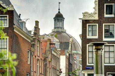 Amsterdam, Netherlands - August 2021: Historical center in cloudy weather, HDR Image