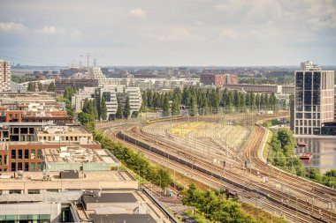 Amsterdam, Netherlands - August 2021: Historical center in cloudy weather, HDR Image