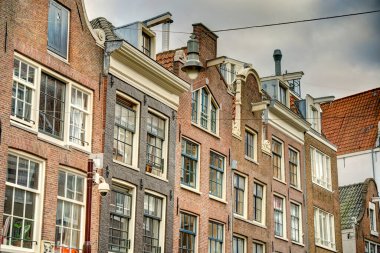 Amsterdam, Netherlands - August 2021: Historical center in cloudy weather, HDR Image