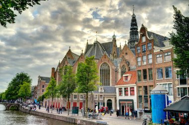 Amsterdam, Netherlands - August 2021: Historical center in cloudy weather, HDR Image