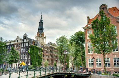 Amsterdam, Netherlands - August 2021: Historical center in cloudy weather, HDR Image