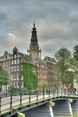 Amsterdam, Netherlands - August 2021: Historical center in cloudy weather, HDR Image