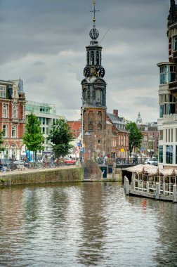 Amsterdam, Netherlands - August 2021: Historical center in cloudy weather, HDR Image