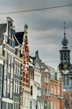 Amsterdam, Netherlands - August 2021: Historical center in cloudy weather, HDR Image