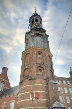 Amsterdam, Netherlands - August 2021: Historical center in cloudy weather, HDR Image