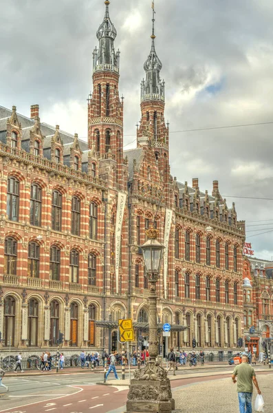 Amsterdam, Netherlands - August 2021: Historical center in cloudy weather, HDR Image