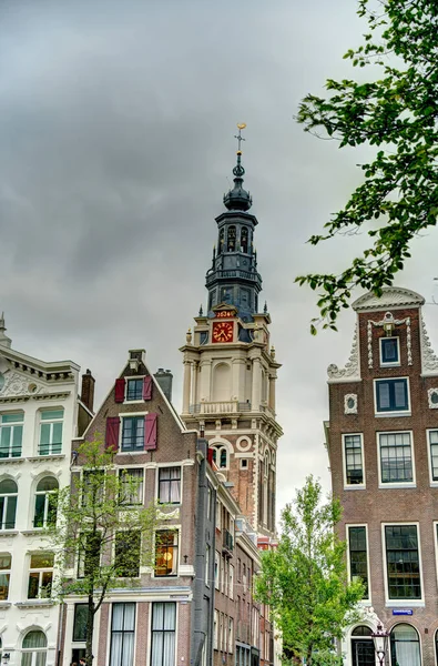 Amsterdam, Netherlands - August 2021: Historical center in cloudy weather, HDR Image