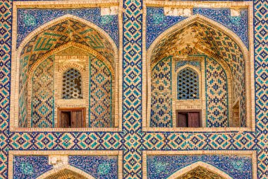 Bukhara, Uzbekistan - October 2019 : Qosh Madrasah in sunny weather