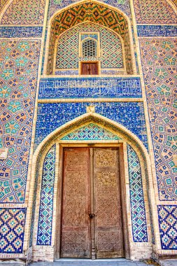 Bukhara, Uzbekistan - October 2019 : Qosh Madrasah in sunny weather