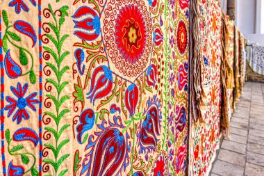 Bukhara, Uzbekistan - October 2019 : Suzani carpets on display