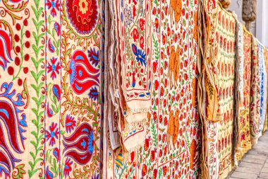 Bukhara, Uzbekistan - October 2019 : Suzani carpets on display