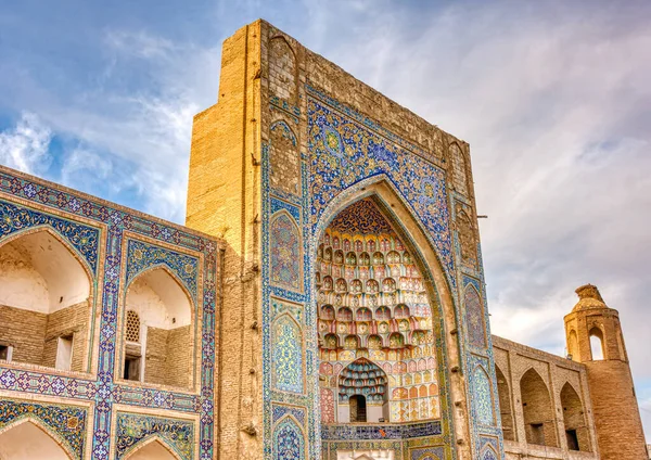Bukhara, Uzbekistan - October 2019 : Qosh Madrasah in sunny weather