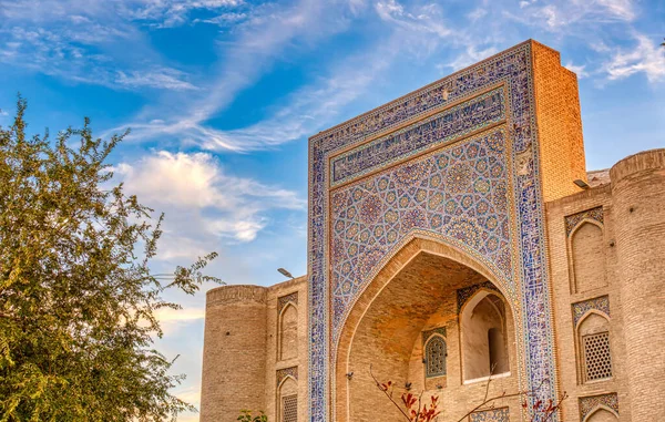 Bukhara, Uzbekistan - October 2019 : Po-i-Kalyan or Poi Kalan Ensemble in sunny weather