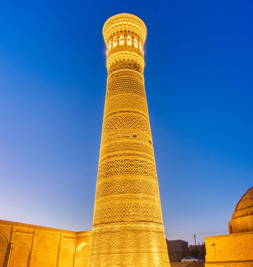 Bukhara, Uzbekistan - October 2019 : Poi Kalan or Po-i-Kalyan at dusk