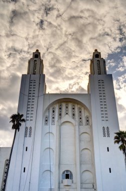 Casablanca, Morocco - November 2021 : Arab League Park and Cathedral in cloudy weather, HDR Image