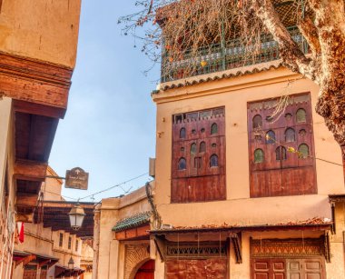 Fez Medina landmarks, Morocco on background