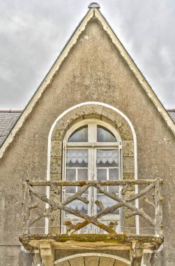 Locronan, France - June 2021 : Historical village in cloudy weather