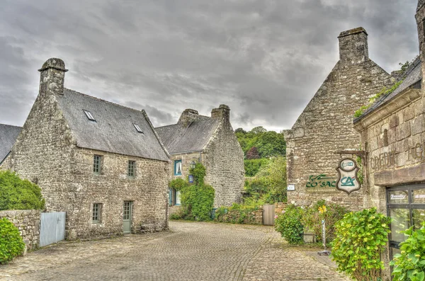 Locronan, France - June 2021 : Historical village in cloudy weather