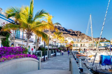 Puerto de Mogan, Spain - February 2020 : Picturesque seaside resort in sunny weather