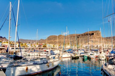 Puerto de Mogan, Spain - February 2020 : Picturesque seaside resort in sunny weather