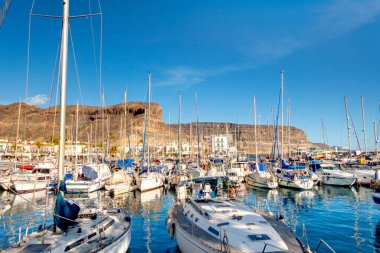 Puerto de Mogan, Spain - February 2020 : Picturesque seaside resort in sunny weather