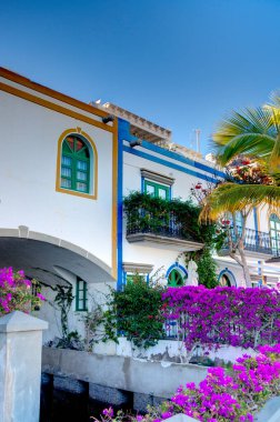 Puerto de Mogan, Spain - February 2020 : Picturesque seaside resort in sunny weather