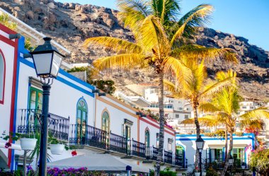 Puerto de Mogan, Spain - February 2020 : Picturesque seaside resort in sunny weather