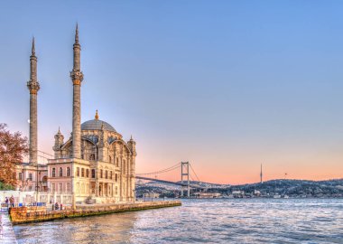 Istanbul, Turkey, October 23, 2019: View of Ortakoy Mosque at the sunset clipart