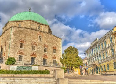 Pecs, Hungary - March 2017: Historical center in cloudy weather, HDR                  