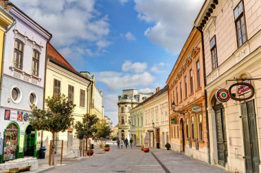 Pecs, Hungary - March 2017: Historical center in cloudy weather, HDR                  