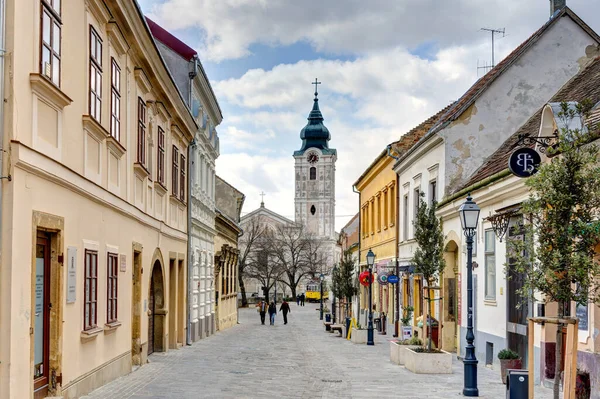 Pecs, Hungary - March 2017: Historical center in cloudy weather, HDR                  