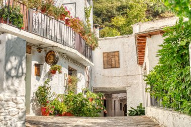 La Alpujarra, Spain - September, 2020: Picturesque village in summertime, HDR