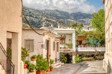 La Alpujarra, Spain - September, 2020: Picturesque village in summertime, HDR