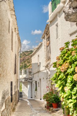 La Alpujarra, Spain - September, 2020: Picturesque village in summertime, HDR