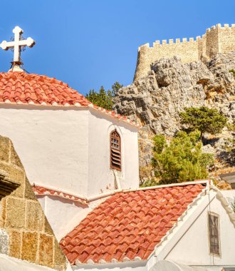 Lindos, Greece - September 2021 : Historical village in sunny weather