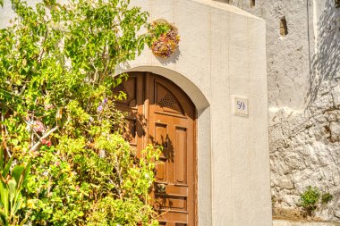 Lindos, Greece - September 2021 : Historical village in sunny weather