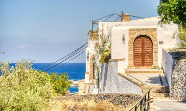 Lindos, Greece - September 2021 : Historical village in sunny weather