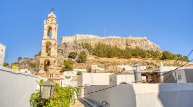Lindos, Greece - September 2021 : Historical village in sunny weather
