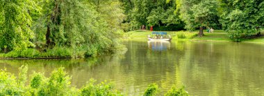 Warsaw, Poland - August 2021: Lazienki Park in cloudy weather