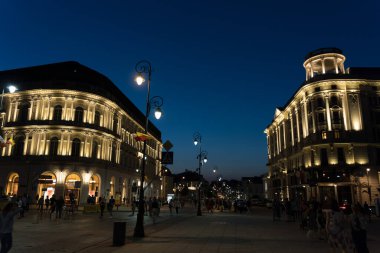 Warsaw, Poland - August 2021 : Nowy Swiat Street at dusk