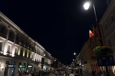 Warsaw, Poland - August 2021 : Nowy Swiat Street at dusk