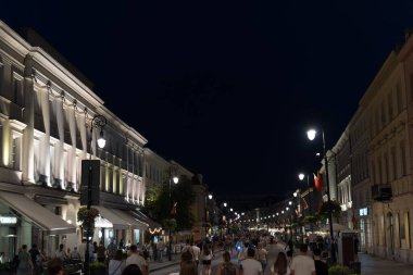 Warsaw, Poland - August 2021 : Nowy Swiat Street at dusk