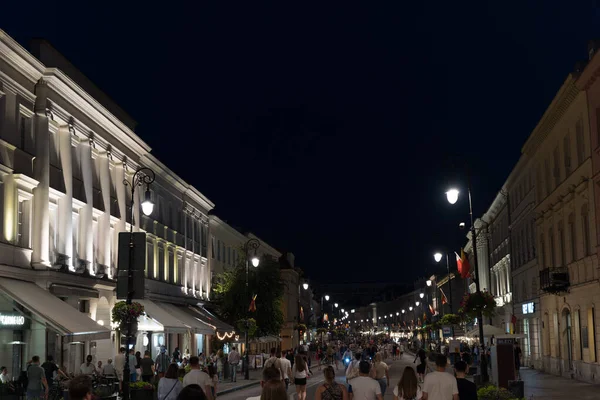 Warsaw, Poland - August 2021 : Nowy Swiat Street at dusk