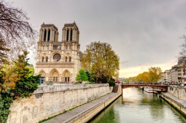 Paris, France - April 2019 : Notre Dame cathedral in cloudy weather