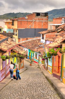 Guatape, Antioquia, Colombia - May 2019 : Colorful village in cloudy weather