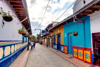 Guatape, Antioquia, Colombia - May 2019 : Colorful village in cloudy weather