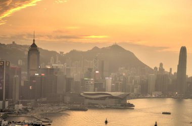HONG KONG - FEBRUARY 2019 : Panorama on the harbour at sunset