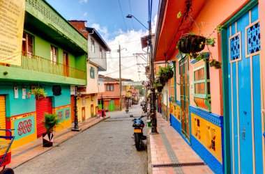 Guatape, Antioquia, Colombia - May 2019 : Colorful village in cloudy weather