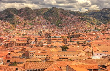 CUSCO, PERU - APRIL 2018: Rooftops of the historical center in cloudy weather