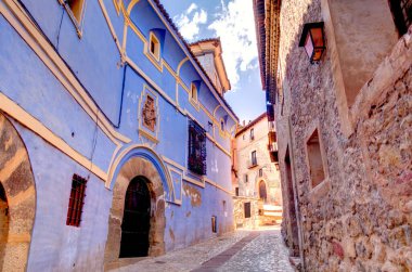 ALBARRACIN, SPAIN - JUNE 2019: Historical center in sunny weather, HDR image